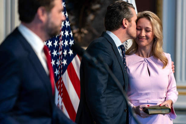 Pete Hegseth kisses his wife